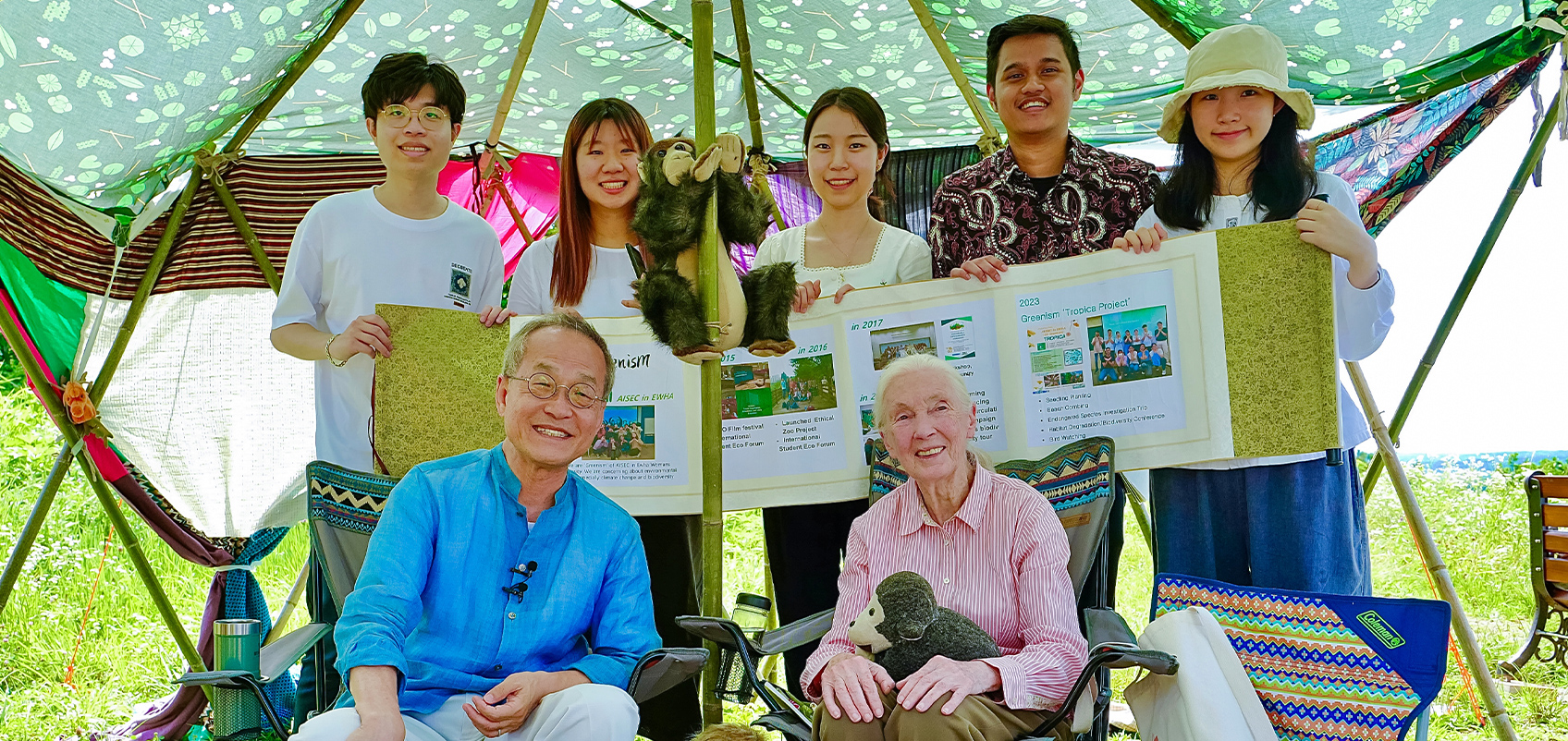 Group photo of people with Jane Goodall