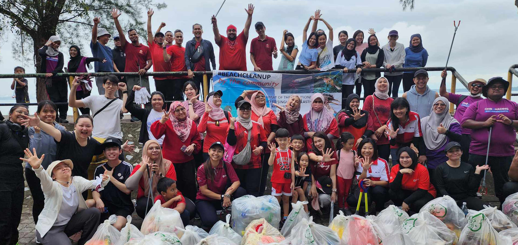 Group photo of people participating in cleanup activities