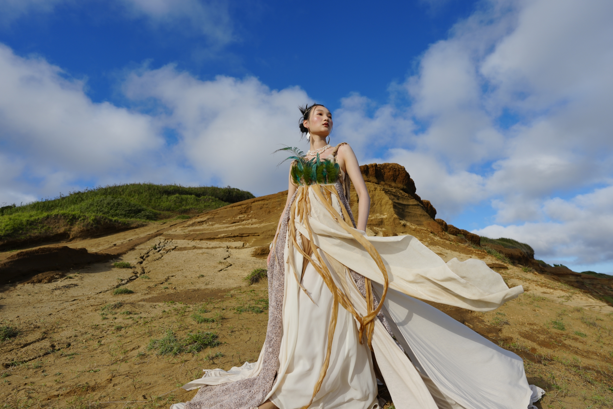 Example image showing a woman posing on sand Click to open modal